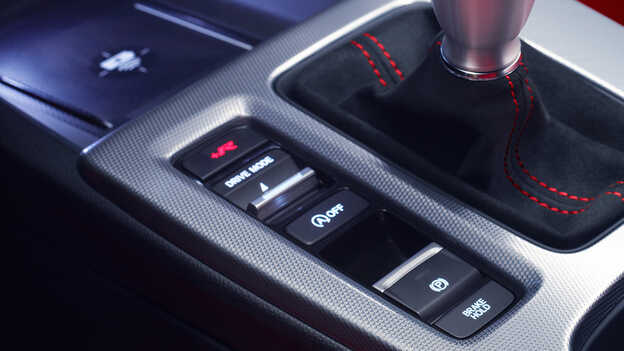 Detailný pohľad na panel s jazdnými režimami modelu Honda Civic Type R. 